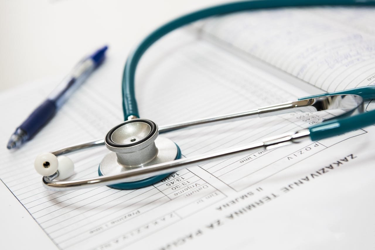 A medical instrument for listening to the action of someone's heart or breathing.
