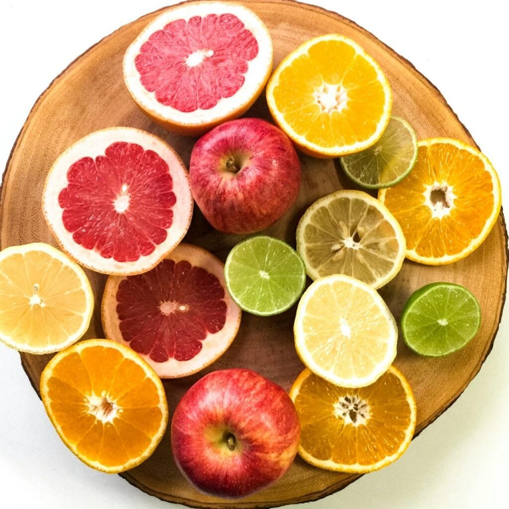 A variety of citrus fruits, likely including oranges, grapefruits, lemons, and limes.